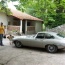 Its not Johns E Type, and yes that is a hand bag
