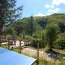 The table tennis overlooks the boules court