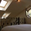 The Wolf Suite mezzanine level and the metre wide round window - best view in the house.